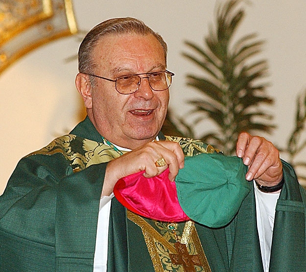 Bishop Edward Kmiec pulls out a green zucchetto to wear in honor of St. Patrick's Day as he celebrates Mass at St. Joseph's Cathedral in 2005. The Mass precedes the annual St. Patrick's Day Parade.